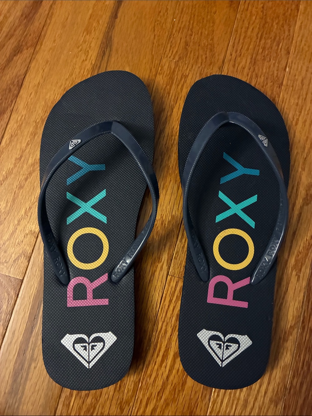 Roxy Black Flip Flops with Rainbow Logo